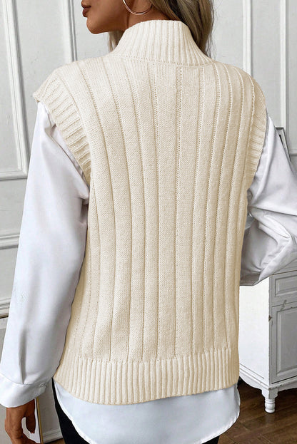Chaleco de punto trenzado de cuello alto color avena